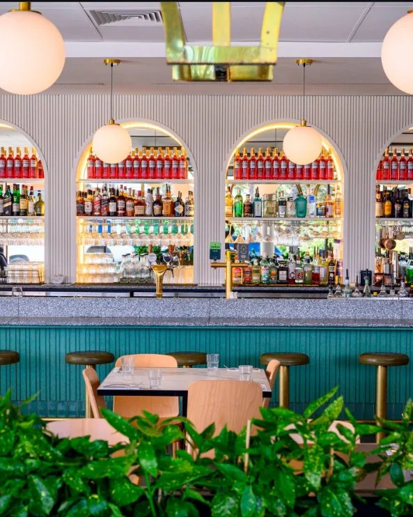 Arched back bar and green counter at Julia’s Ringwood North